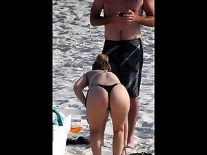 Hot ass of tattooed girl dancing on the beach Picture 1