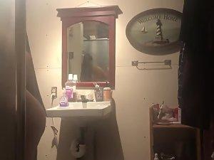 Ravishing naked butt spied in her bathroom Picture 1