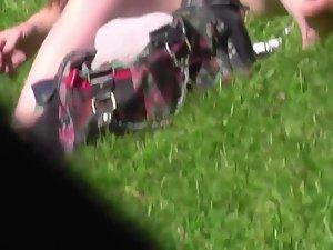 Pussy touching the grass in upskirt Picture 3