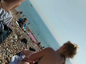Nipple caught by lucky voyeur on beach Picture 2