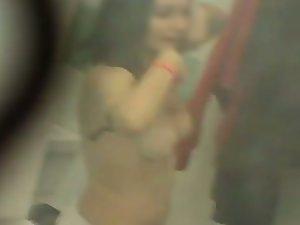 Young soccer girl is peeped fully naked