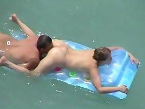 He eats her ass and pussy in the water