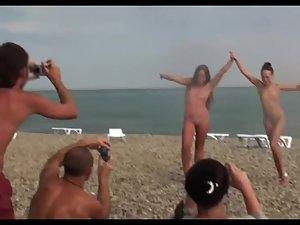 Nude girls pose for a photo and a voyeur Picture 3