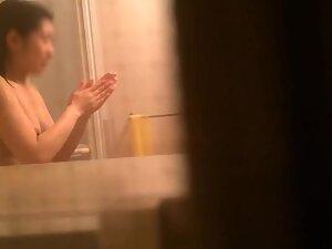 Peeping on naked asian neighbor while she washes hair Picture 6