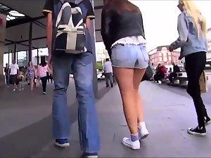Shy girl tries to pull hot pants down Picture 6