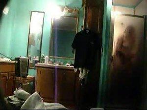 She masturbates under a shower Picture 2