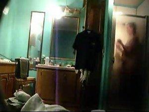 She masturbates under a shower Picture 6