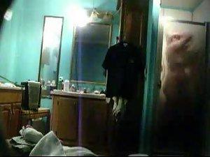 She masturbates under a shower Picture 7