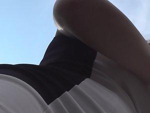 Scoring an upskirt while talking Picture 5