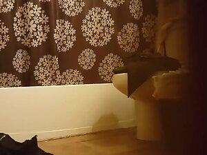 Peeping under door to see naked roommate Picture 1