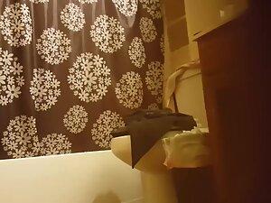 Peeping under door to see naked roommate Picture 2