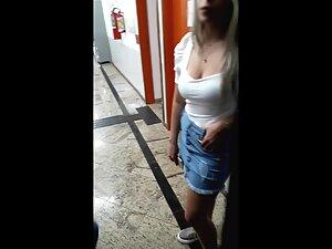 Checking out her big tits while she waits for someone Picture 3