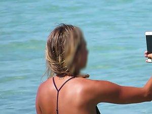Hot beach girls paddle their surfboard Picture 6