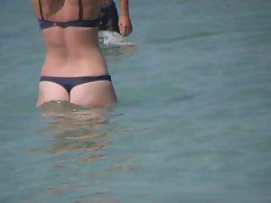 Hot milf enters the water to swim Picture 4