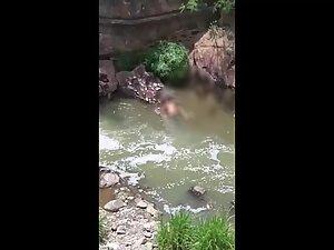 Sex in the river caught from a tall nearby building Picture 8