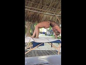 Flexible girl shows off in transparent swimsuit Picture 8