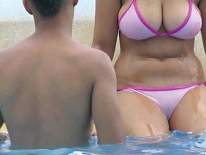 Teen with incredible big boobs on edge of swimming pool Picture 7