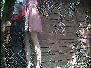 Quick sex caught next to a fence Picture 6