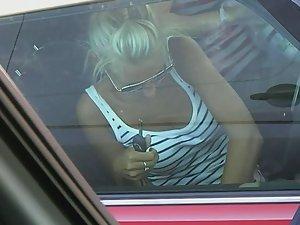 Upskirt of hot blonde when she enters the car Picture 1