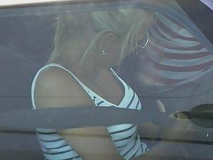 Upskirt of hot blonde when she enters the car Picture 3