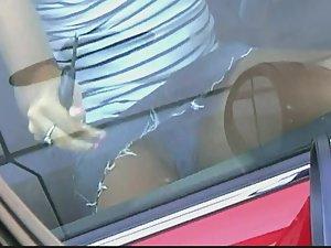 Upskirt of hot blonde when she enters the car