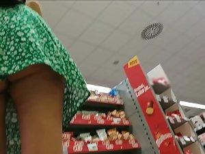 Upskirt seen when she tilts forward in the store Picture 2