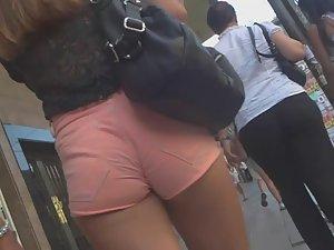 Pink shorts deep in young ass crack