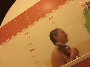 Spying on surprisingly hairy bush and perky tits in bathroom Picture 2