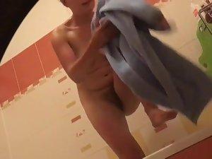 Spying on surprisingly hairy bush and perky tits in bathroom Picture 7