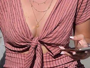 Necklace pendant between great boobs