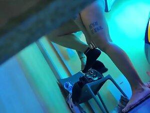 Peeping on epic tattooed girl in tanning studio Picture 4