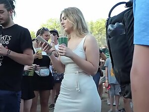 Sexy pear shaped body in tight whitish dress