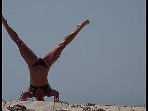 Epic girl does her exercises on the beach Picture 1