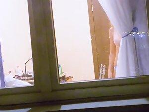 Window peep on neighbor's juicy naked tits Picture 2