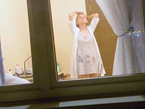 Window peep on neighbor's juicy naked tits Picture 8