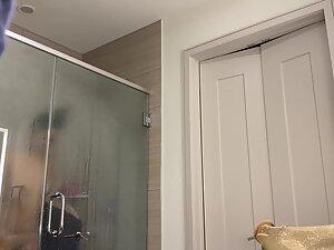 Spying on latina's small tits and hard brown nipples in bathroom Picture 1