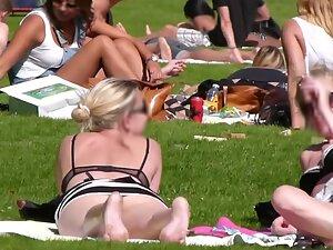 Upskirt of hot blonde friends relaxing in the park Picture 5