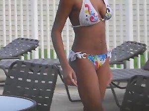 Sexy girl in a bikini walking by the pool Picture 2