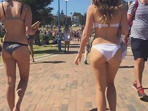 Fancy girl in white bikini walking by the beach Picture 3
