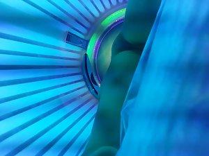 Checking out hot shaved pussy in tanning machine Picture 8