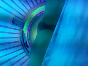 Checking out hot shaved pussy in tanning machine