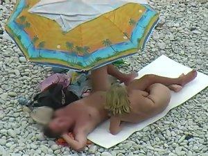 Sexy milf lying next to her man Picture 2