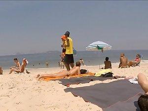 Beach voyeur inspects two girls on the go Picture 3