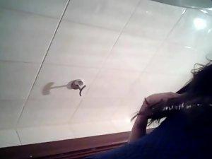 Pink anus winks to the hidden camera during peeing Picture 1