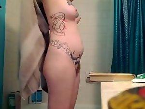 Crazy tattooed girl caught fully nude Picture 1