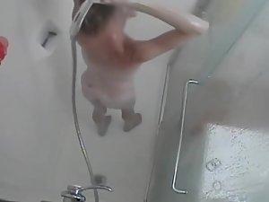 Hidden cam caught her shower and shave Picture 5