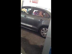 Car sex in front of everybody at the gas station Picture 3