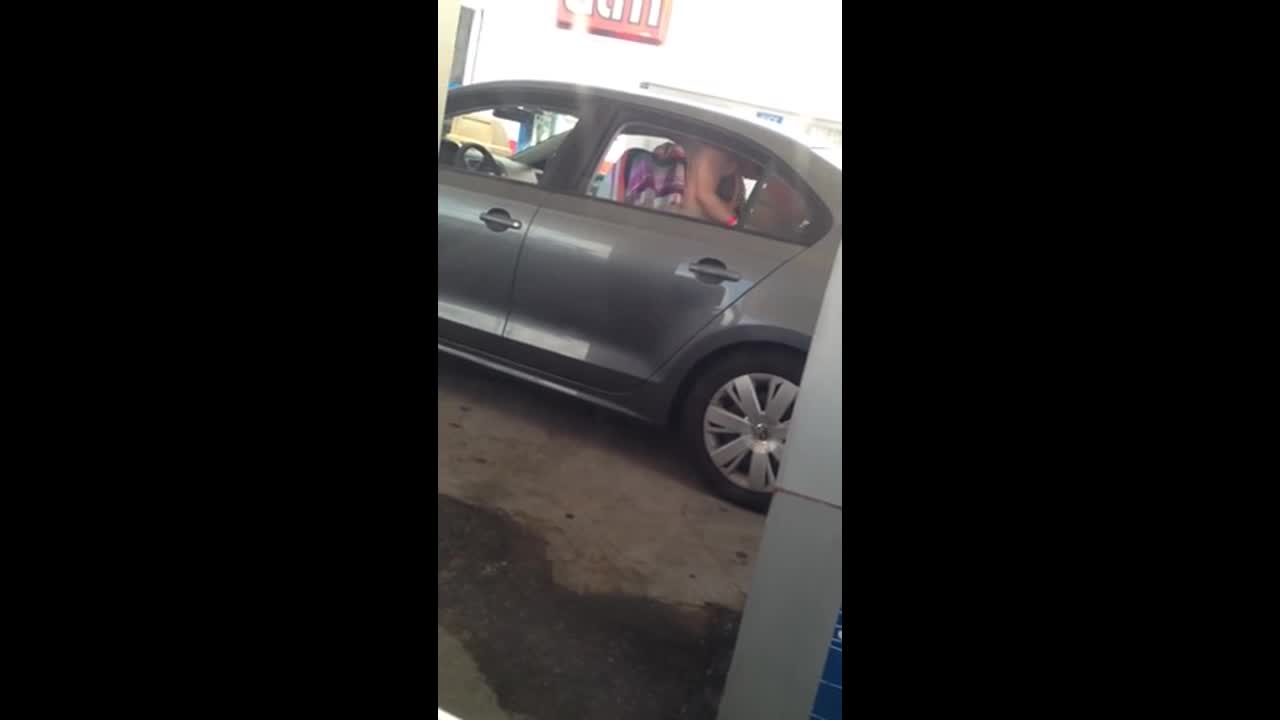 Car sex in front of everybody at the gas station picture