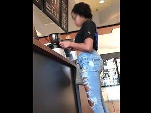 Checking out nerdy black girl while she orders coffee