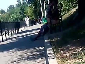 Teenagers fucking on a park bench